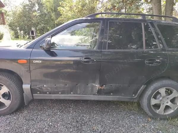 Second-hand Hyundai Santa Fe 113 CP (83 kW) 2005 Negru SUV