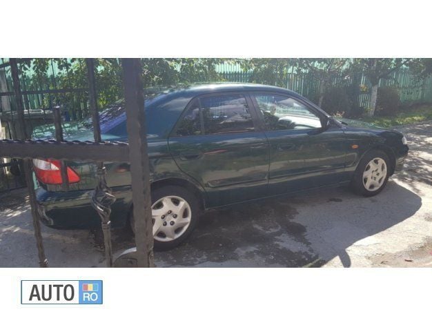 Verde Utilizat 2003 Mazda 626 Berlinǎ | 1.750 EUR - Imagine 1/4