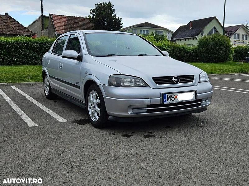 Culoareargint Utilizat 2003 Opel Astra Coupe | 1.149 EUR (Preț OK) - Imagine 1/4