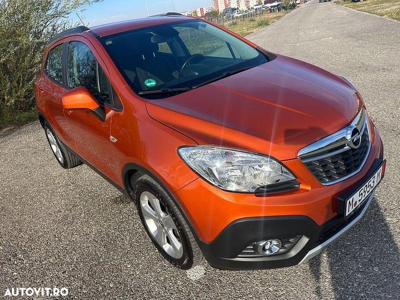 Culoareportocaliu Utilizat 2014 Opel Mokka Color Edition SUV | 8.490 EUR (Preț OK) - Imagine 1/4