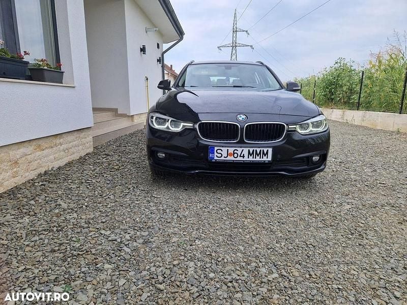 Culoarenegru Utilizat 2015 BMW 320 Break | 9.700 EUR (Preț bun) - Imagine 1/4