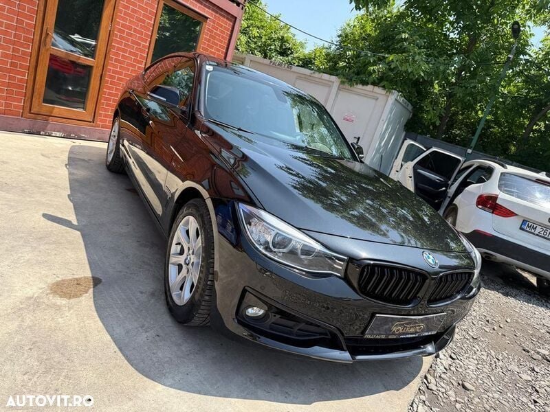 Negru Utilizat 2014 BMW 320 Gran Turismo Luxury Line Berlinǎ | 13.999 EUR (Super Preț) - Imagine 1/4