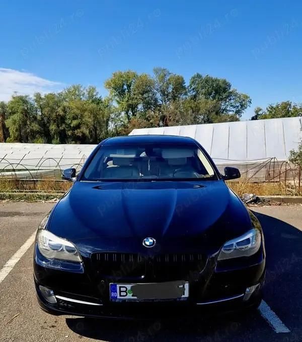 Second-hand BMW 520 184 CP (135 kW) 2011 Negru Berlinǎ