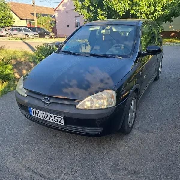 Negru Utilizat 2003 Opel Corsa | 1.000 EUR (Preț bun) - Imagine 1/4