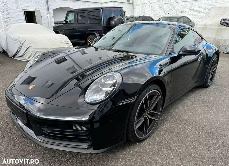 Culoarenegru Utilizat 2024 Porsche 911 Carrera Coupe | 119.185 EUR - Imagine 1/4