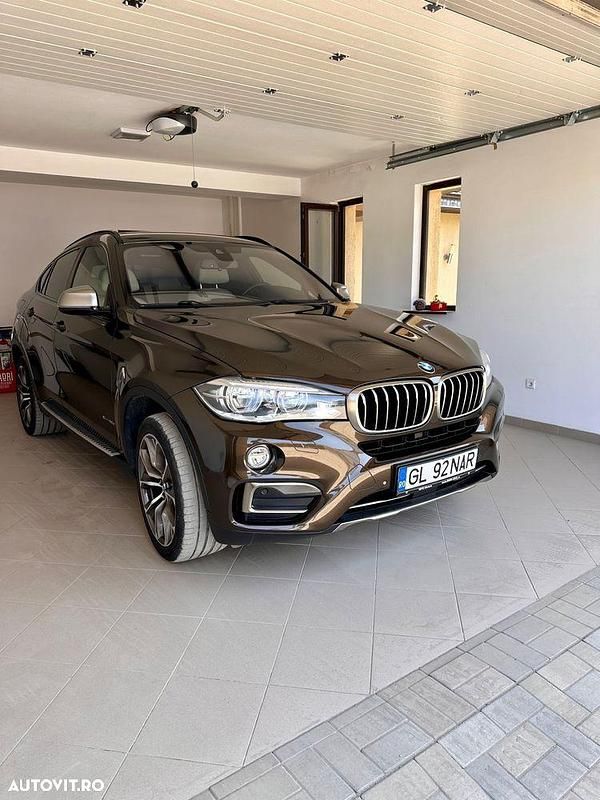 Culoaremaro Utilizat 2016 BMW X6 SUV | 33.900 EUR (Preț OK) - Imagine 1/4