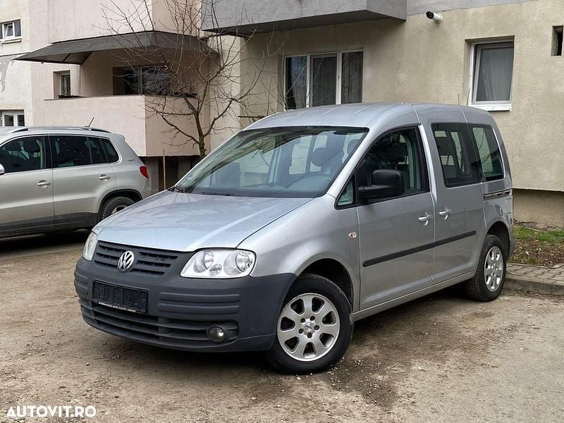 Second-hand VW Caddy Maxi 105 CP (77 kW) 2009 Culoareargint Monovolum