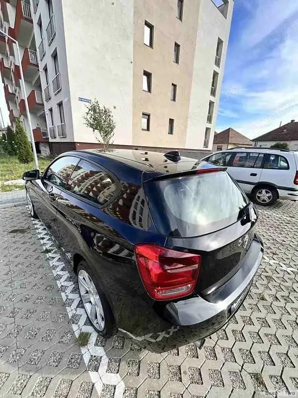 Second-hand BMW 114 102 CP (75 kW) 2014 Negru Hatchback