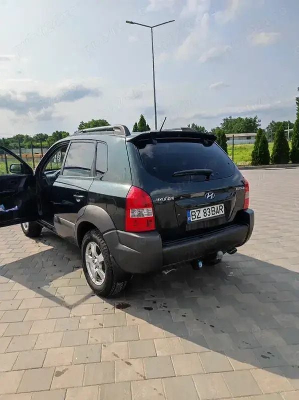 Verde Utilizat 2009 Hyundai Tucson SUV | 3.800 EUR (Super Preț) - Imagine 1/4