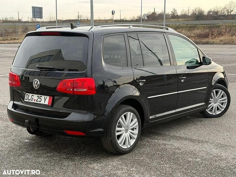 Second-hand VW Touran Highline 140 CP (102 kW) 2012 Culoarenegru Monovolum