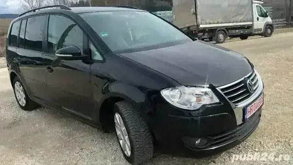 Utilizat 2009 VW Touran Monovolum | 4.490 EUR (Preț OK) - Imagine 1/4