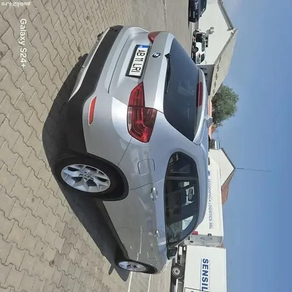 Gri Utilizat 2012 BMW X1 SUV | 9.900 EUR (Preț bun) - Imagine 1/4