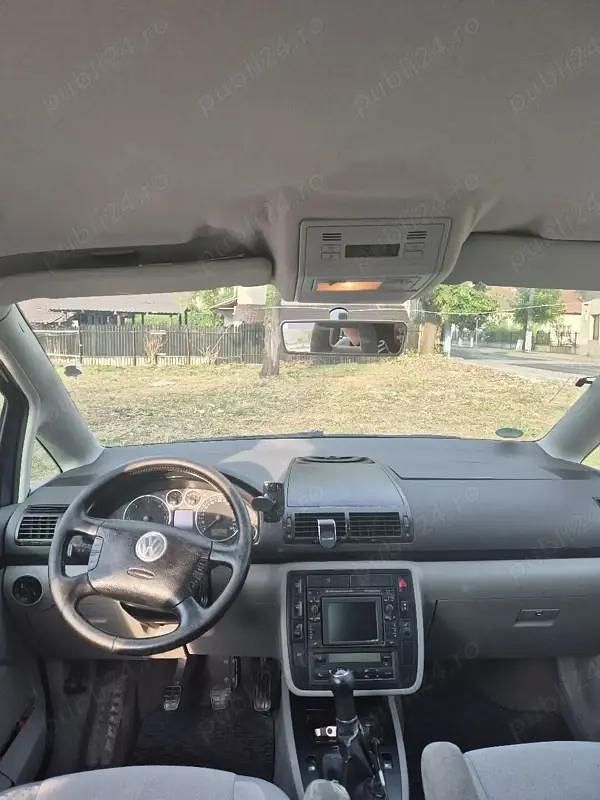 Second-hand VW Sharan 131 CP (96 kW) 2006 Albastru Monovolum
