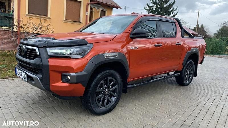 Culoareportocaliu Utilizat 2023 Toyota HiLux Edition Pickup | 47.990 EUR (Preț OK) - Imagine 1/4