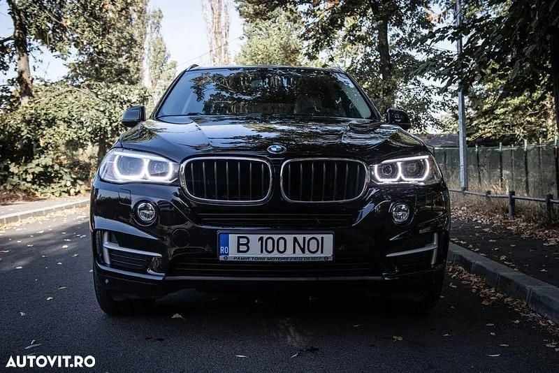 Negru Utilizat 2014 BMW X5 SUV | 19.900 EUR (Preț bun) - Imagine 1/4