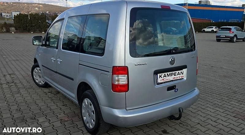 Second-hand VW Caddy Family 102 CP (75 kW) 2008 Culoareargint Monovolum