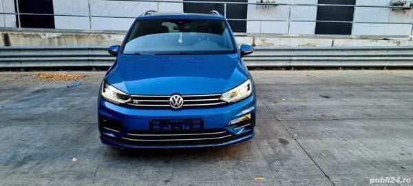 Second-hand VW Touran Highline 150 CP (110 kW) 2017 Albastru Monovolum
