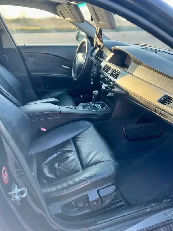 Second-hand BMW 520 163 CP (119 kW) 2006 Negru Berlinǎ