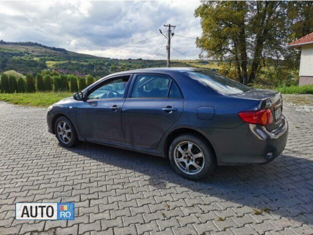 Gri Utilizat 2008 Toyota Corolla Berlinǎ | 4.100 EUR - Imagine 1/4