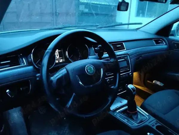 Gri Utilizat 2011 Skoda Superb Break | 4.199 EUR (Preț bun) - Imagine 1/4