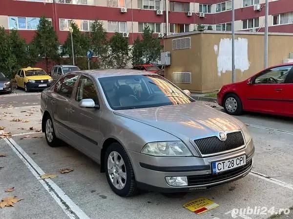 Gri Utilizat 2006 Skoda Octavia Hatchback | 2.600 EUR (Preț OK) - Imagine 1/4