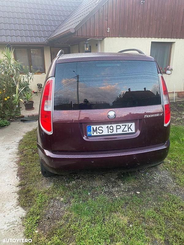 Second-hand Skoda Roomster Style 105 CP (77 kW) 2009 Culoarerosu Monovolum