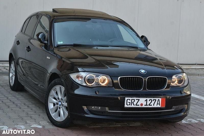 Culoarenegru Utilizat 2009 BMW 120 Sport Line Hatchback | 4.990 EUR (Preț OK) - Imagine 1/4