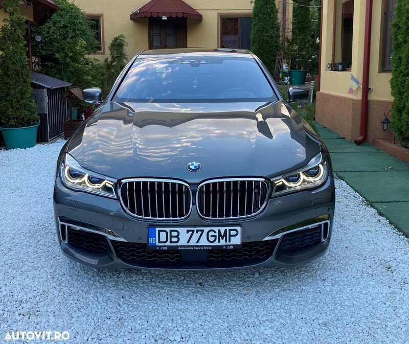 Gri Utilizat 2017 BMW 750 Berlinǎ | 34.985 EUR - Imagine 1/4