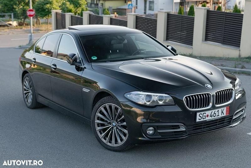 Culoarenegru Utilizat 2014 BMW 520 Berlinǎ | 13.000 EUR (Super Preț) - Imagine 1/4