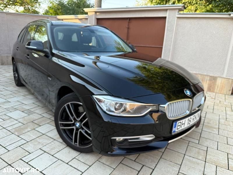 Culoarenegru Utilizat 2013 BMW 320 Break | 10.199 EUR (Preț OK) - Imagine 1/4