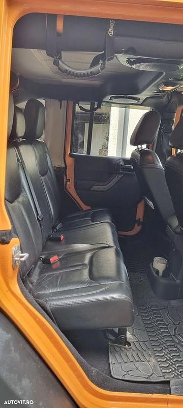 Second-hand Jeep Wrangler 200 CP (147 kW) 2013 Culoareportocaliu SUV