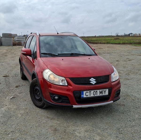 Portocaliu Utilizat 2012 Suzuki SX4 Berlinǎ | 5.950 EUR - Imagine 1/4