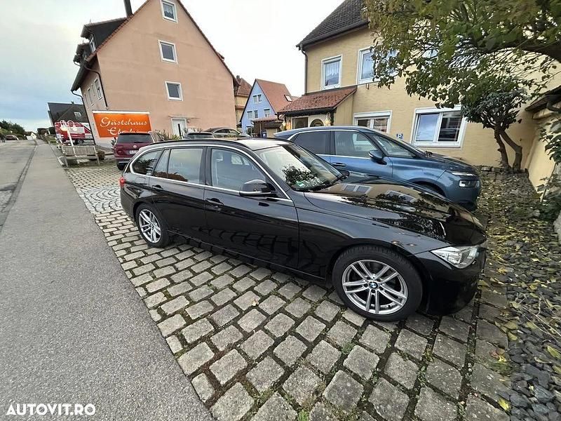 Second-hand BMW 318 Sport Line 143 CP (105 kW) 2013 Culoarenegru Break