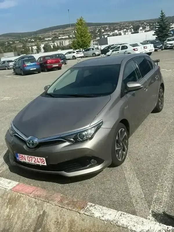 Gri Utilizat 2016 Toyota Auris Hybrid Hatchback | 15.500 EUR (Scump) - Imagine 1/4