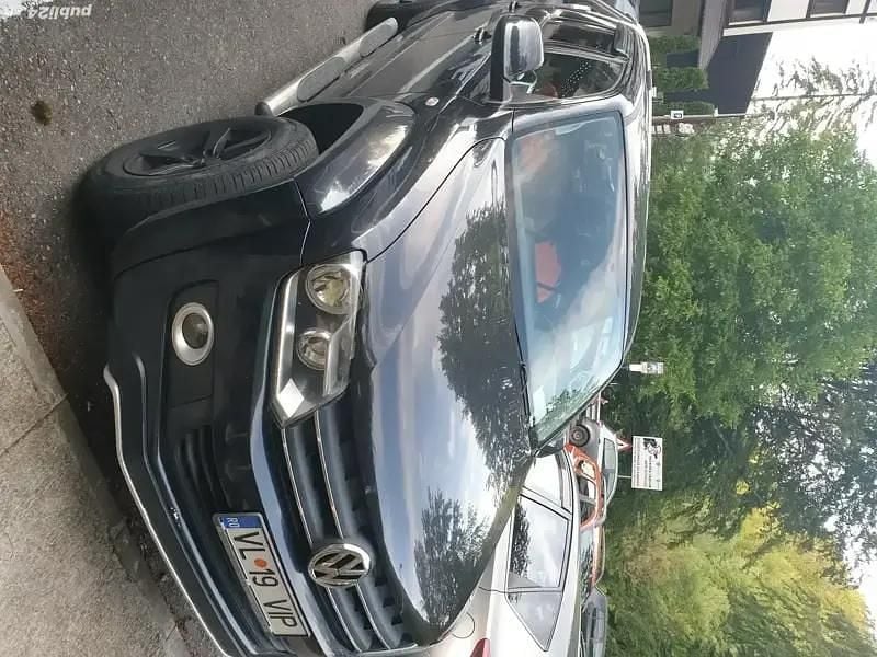 Second-hand VW Amarok 163 CP (119 kW) 2012 Negru Pickup