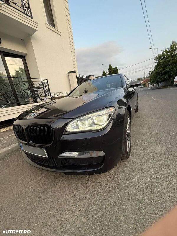 Gri Utilizat 2013 BMW 750 Berlinǎ | 13.500 EUR - Imagine 1/4