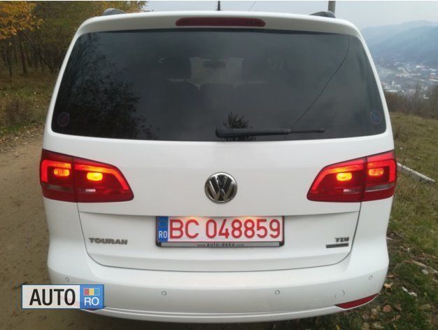 Second-hand VW Touran 105 CP (77 kW) 2012 Alb Monovolum