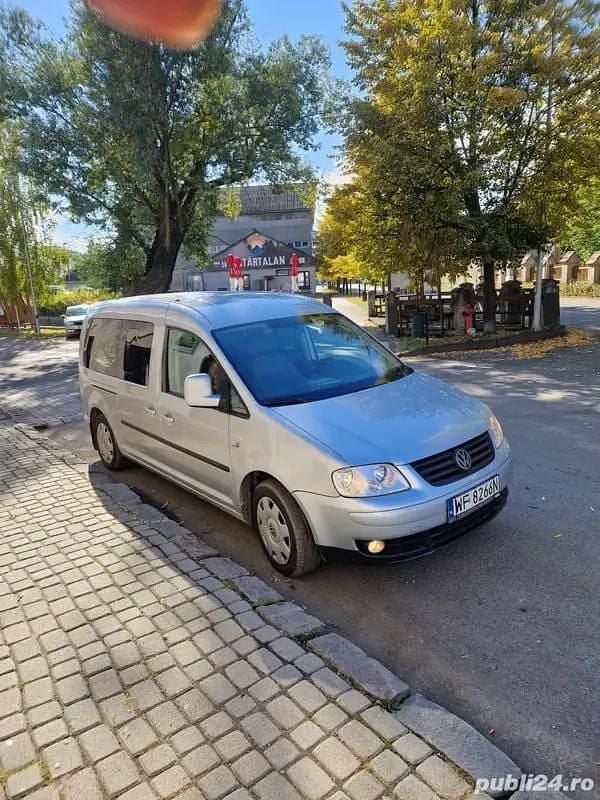 Gri Utilizat 2009 VW Caddy Monovolum | 3.999 EUR (Preț bun) - Imagine 1/4