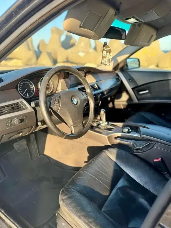 Second-hand BMW 520 163 CP (119 kW) 2006 Negru Berlinǎ