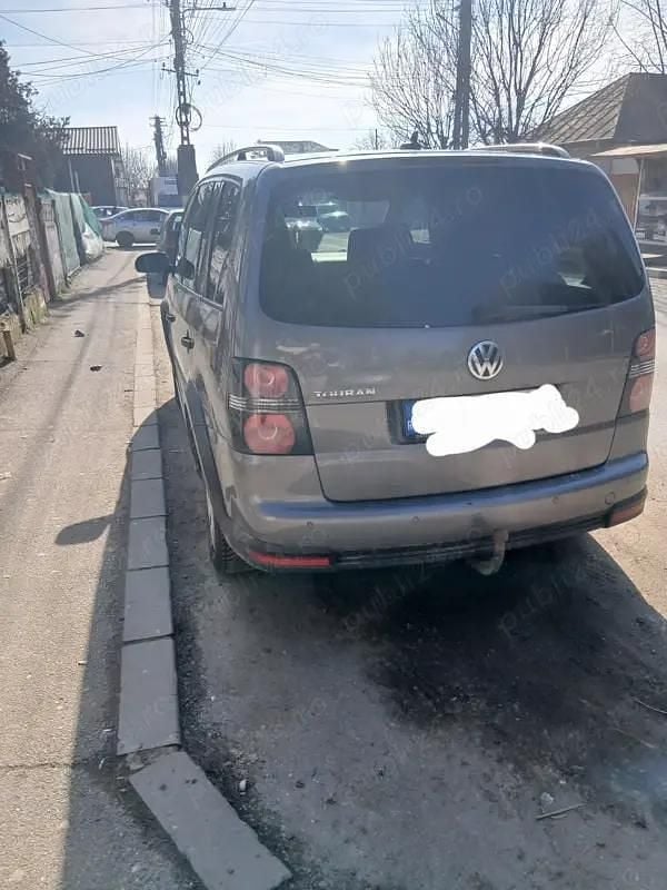 Second-hand VW Touran 170 CP (125 kW) 2009 Monovolum