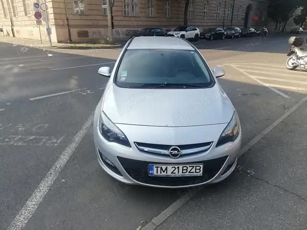 Argintiu Utilizat 2016 Opel Astra Hatchback | 5.900 EUR (Super Preț) - Imagine 1/4