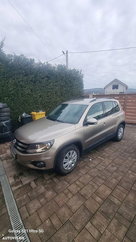 Second-hand VW Tiguan Track & Field 140 CP (102 kW) 2013 Culoaregalbeuriu SUV