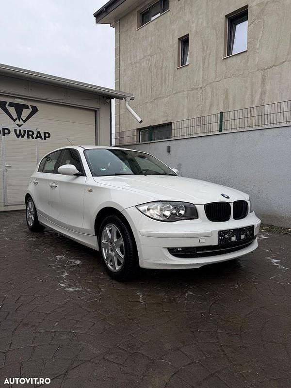 Second-hand BMW 116 115 CP (84 kW) 2008 Culoarealb Hatchback
