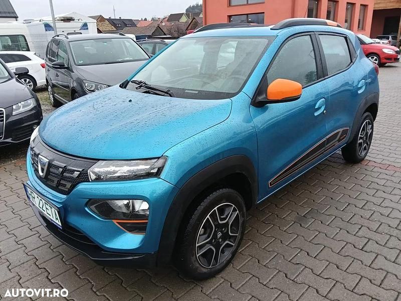 Culoarealbastru Utilizat 2022 Dacia Spring Comfort Plus Hatchback | 7.853 EUR (Preț bun) - Imagine 1/4