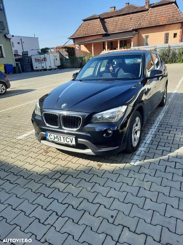 Culoarenegru Utilizat 2012 BMW X1 SUV | 8.500 EUR (Preț OK) - Imagine 1/4