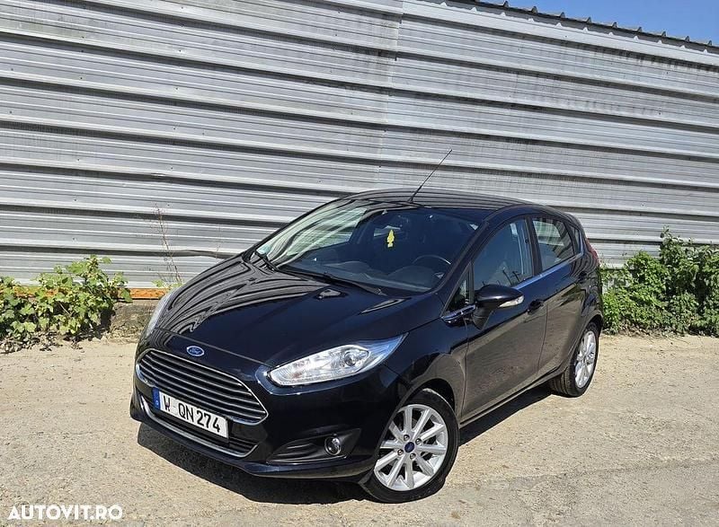 Culoarenegru Utilizat 2015 Ford Fiesta Titanium Hatchback | 5.499 EUR (Preț bun) - Imagine 1/4