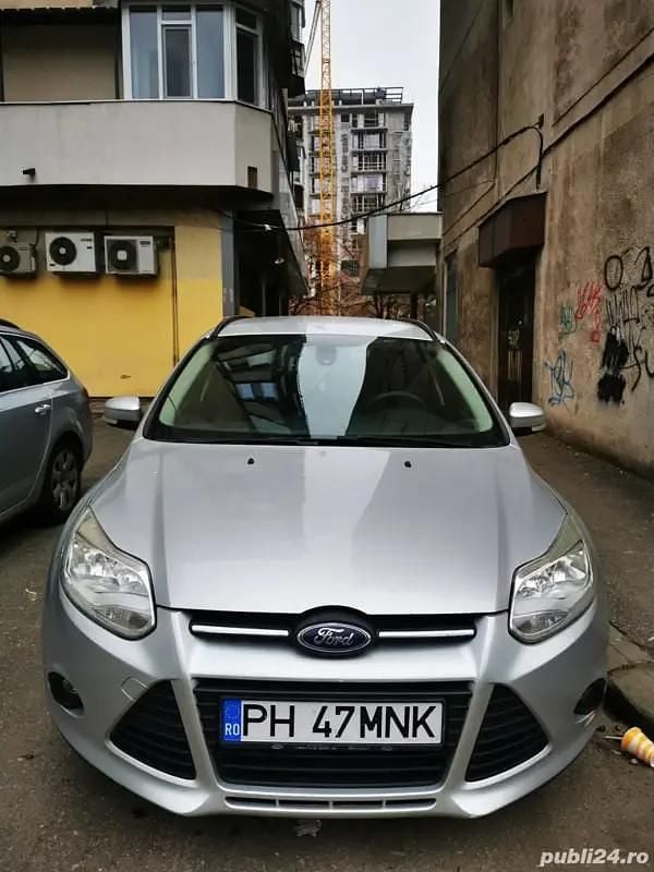 Gri Utilizat 2014 Ford Focus Break | 5.500 EUR (Preț bun) - Imagine 1/4