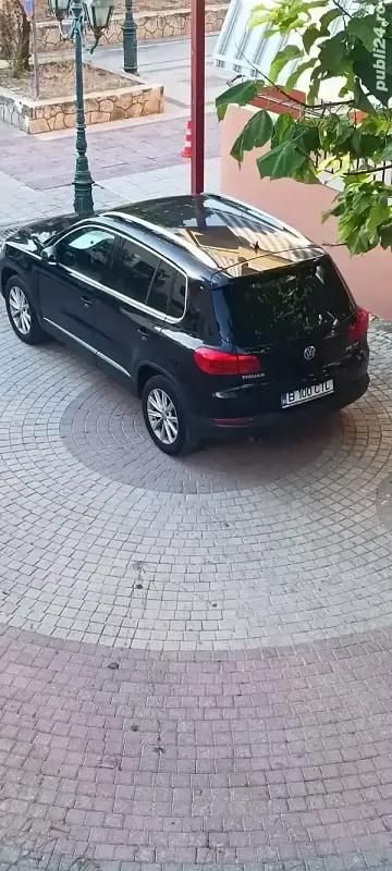 Negru Utilizat 2015 VW Tiguan SUV | 12.345 EUR (Super Preț) - Imagine 1/4