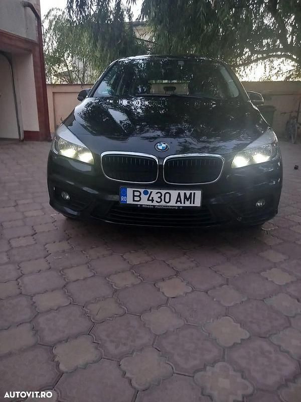 Culoarenegru Utilizat 2016 BMW 218 Gran Tourer Sport Line Monovolum | 8.100 EUR - Imagine 1/4