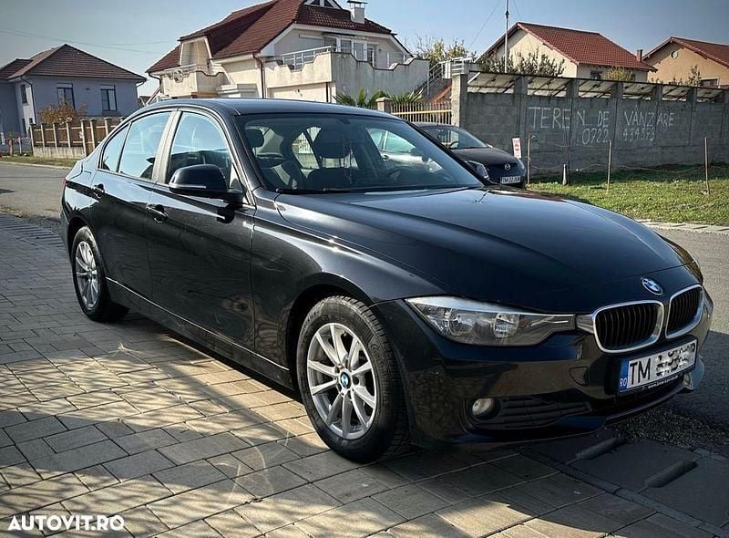 Culoarenegru Utilizat 2014 BMW 316 Berlinǎ | 7.000 EUR (Super Preț) - Imagine 1/3